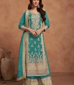 Teal green embroidered silk semi stitched salwar suit