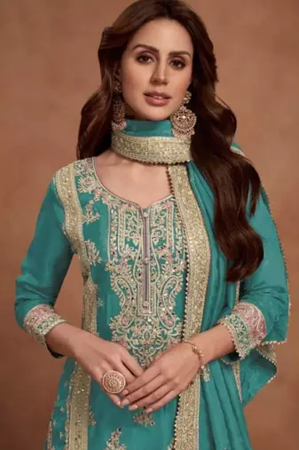 Teal green embroidered silk salwar suit