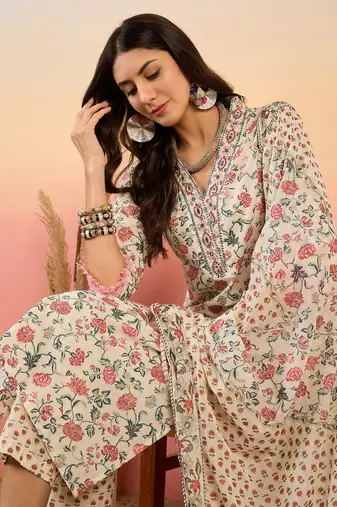 Cream embroidered cotton v neck kurta sets