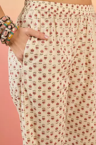 Cream embroidered cotton v neck kurta sets