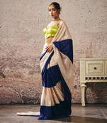 Neon green blouse blue and beige block saree