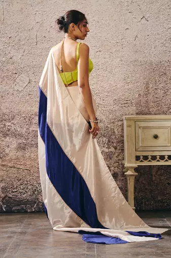Neon green blouse blue and beige block saree