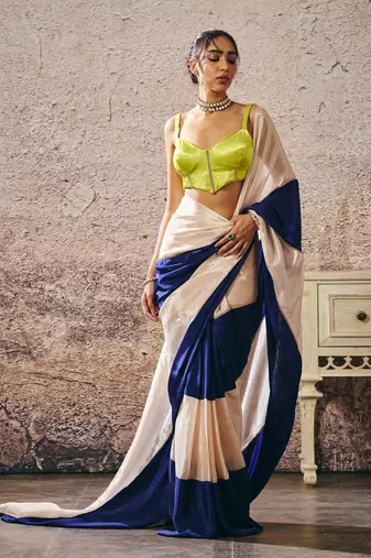 Neon green blouse blue and beige block saree