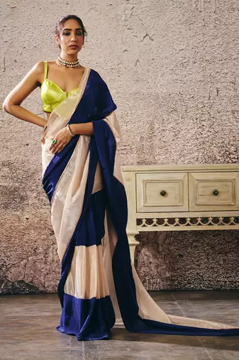 Neon green blouse blue and beige block saree