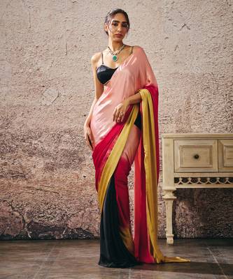 Black blouse with black and red peach gold ombre saree 1