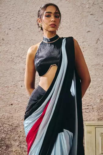 Black blouse with black blue hot pink colour block saree