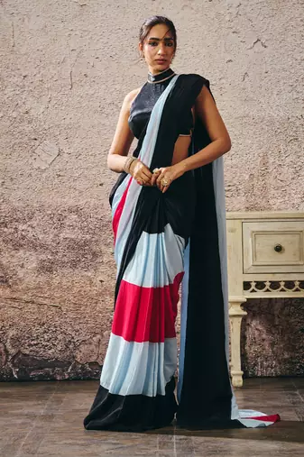 Black blouse with black blue hot pink colour block saree