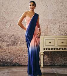 Peach blouse with peach and navy blue ombre saree