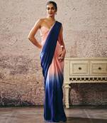 Peach blouse with peach and navy blue ombre saree