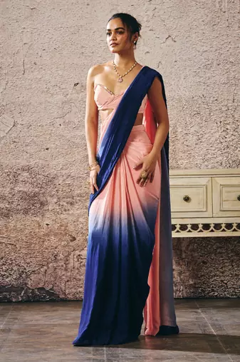Peach blouse with peach and navy blue ombre saree