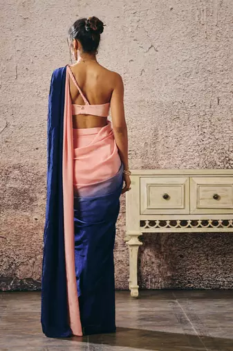 Peach blouse with peach and navy blue ombre saree