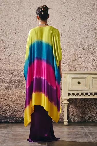 Hot pink blouse and purple skirt with ombre shrug
