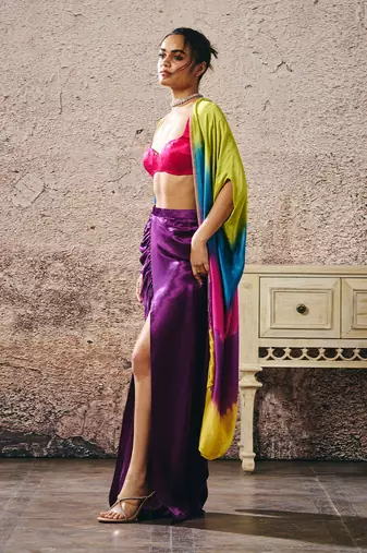 Hot pink blouse and purple skirt with ombre shrug
