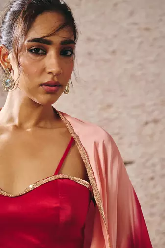 Red skirt with blouse with red and gold peach ombre shrug