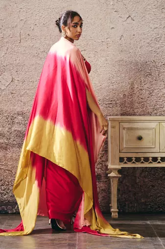 Red skirt with blouse with red and gold peach ombre shrug
