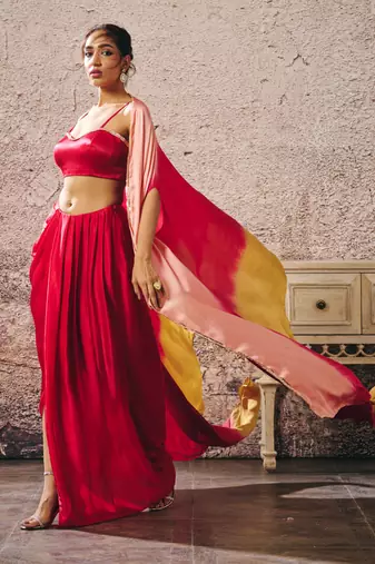 Red skirt with blouse with red and gold peach ombre shrug