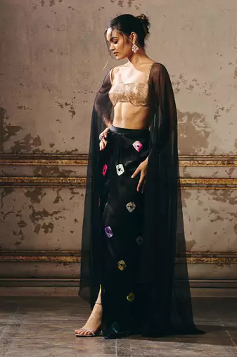 Black shibori skirt with rose gold blouse with cape