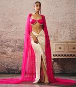 Beige skirt hot pink blouse with hot pink cape