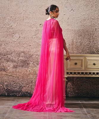 Beige skirt hot pink blouse with hot pink cape 4