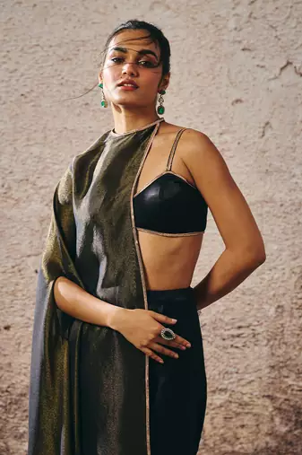 Black blouse with drape skirt with tissue cape