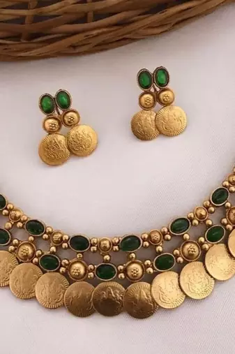 Antique gold temple coin necklace set with emerald green stones traditional south indian  bridal jewelry collection