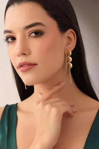 Gold statement earring