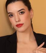 Artistic gold statement earring