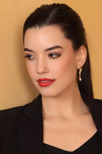 Artistic gold statement earring