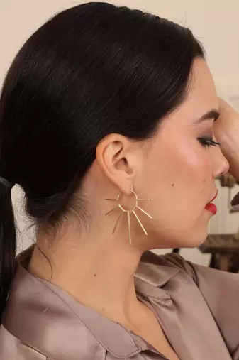 Artistic sun rays gold earring