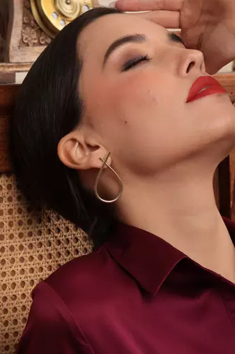 Gold half infinity earring