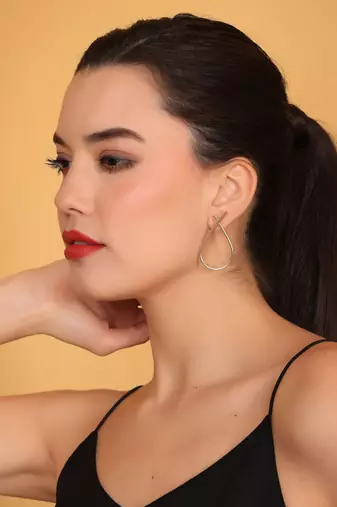 Gold half infinity earring