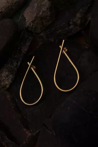 Gold half infinity earring