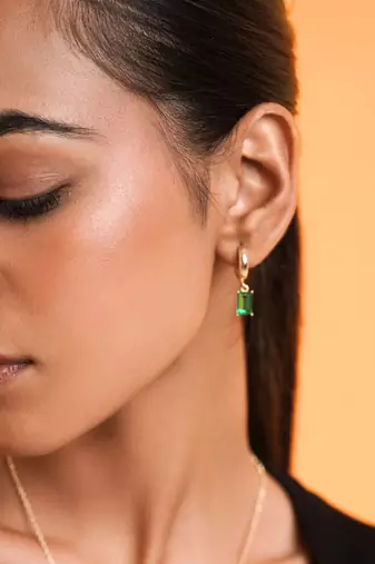 Emerald huggie drop earring