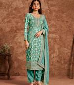 Green premium dolla jacquard embroidered semi stitched salwar suit