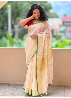 Handmade bhagalpuri linen saree with contrast border in off white shade with blouse piece 1