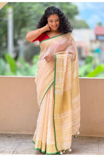 Handmade bhagalpuri linen saree with contrast border in off white shade with blouse piece