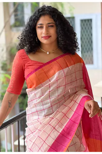 Handmade bhagalpuri linen saree with checks in light babt pink shade with blouse piece