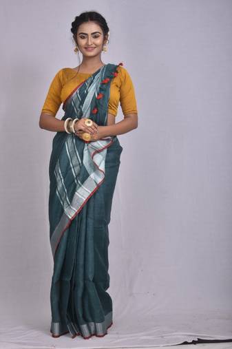 Handmade bhagalpuri linen saree with contrast border in dark green shade with blouse piece
