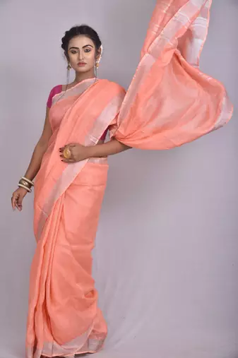 Handmade bhagalpuri linen saree with contrast border in light orange shade with blouse piece