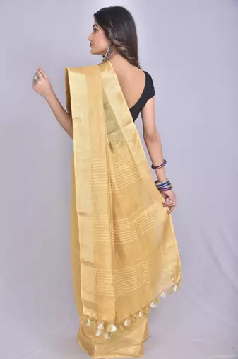 Handmade bhagalpuri tissue linen saree in golden shade with blouse piece
