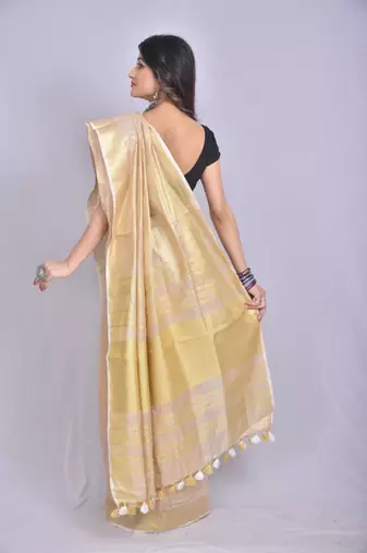 Handmade bhagalpuri tissue linen saree in beige shade with blouse piece