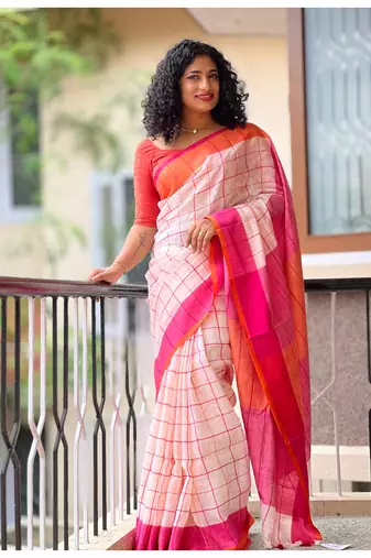 Handmade bhagalpuri linen saree with checks in light babt pink shade with blouse piece