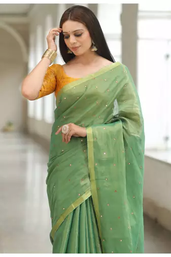 Handmade bhagalpuri tissue linen saree with mirror work in green shade with blouse piece