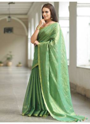 Handmade bhagalpuri tissue linen saree with mirror work in green shade with blouse piece 3