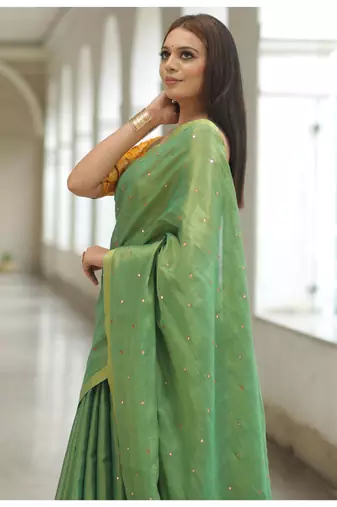 Handmade bhagalpuri tissue linen saree with mirror work in green shade with blouse piece