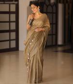 Handmade bhagalpuri linen saree with mirror work in beige shade with blouse piece