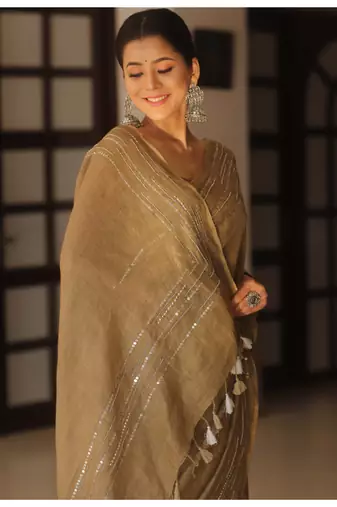 Handmade bhagalpuri linen saree with mirror work in beige shade with blouse piece