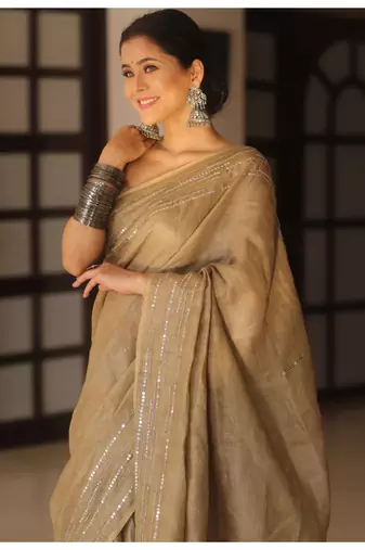 Handmade bhagalpuri linen saree with mirror work in beige shade with blouse piece