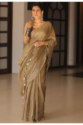 Handmade bhagalpuri linen saree with mirror work in beige shade with blouse piece