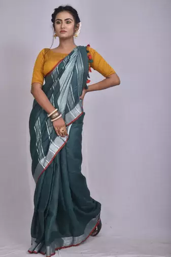 Handmade bhagalpuri linen saree with contrast border in dark green shade with blouse piece